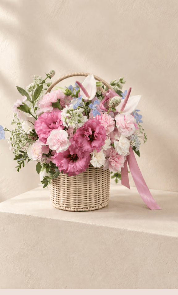 JOIA fresh flower basket with pink and pale blue seasonal blooms